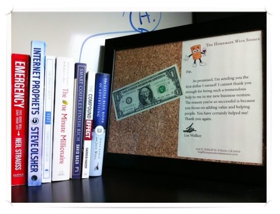 First Dollar Photo of a framed letter and dollar bill, with a letter from Les Walker saying thanking Pat and sending him his first dollar earned