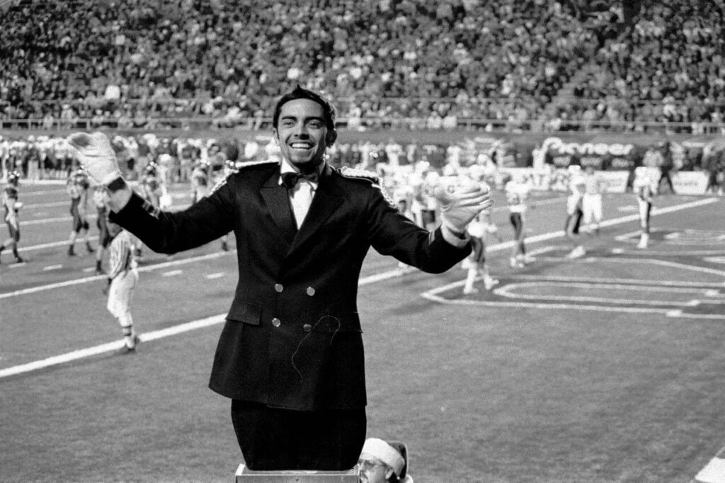 Pat Flynn conducting band in college