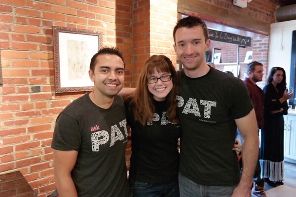Pat, Mindy, and Matt wearing AskPat t-shirts