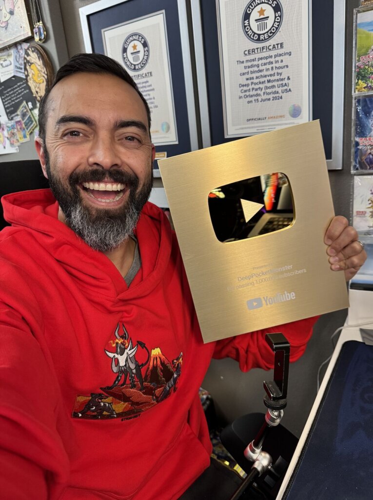 Pat Flynn holding up a YouTube play button