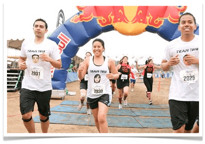 Roc Race Photo Finish Photo of race finish line. April and teammate are smiling, Pat is not.